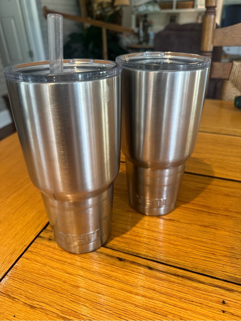 Set of 2 Yeti stainless 32oz tumblers one with lid and straw one with sip lid. - Picture 2 of 4